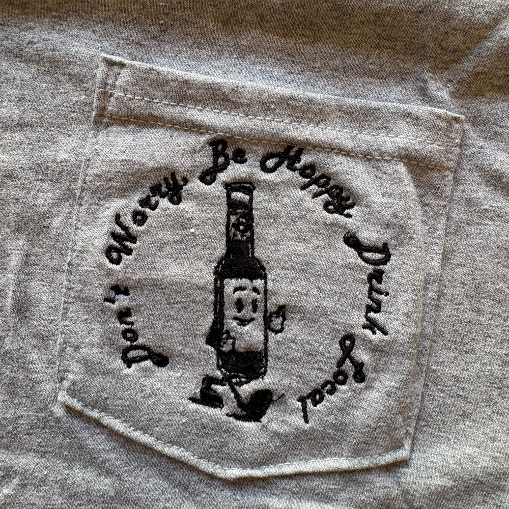 Graphic Pocket Tee with Bottle Character - Light Gray